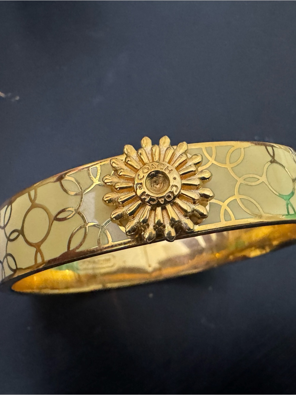 Coach Gold-Tone and Yellow Enamel Hinged Bangle with Starburst Clasp
